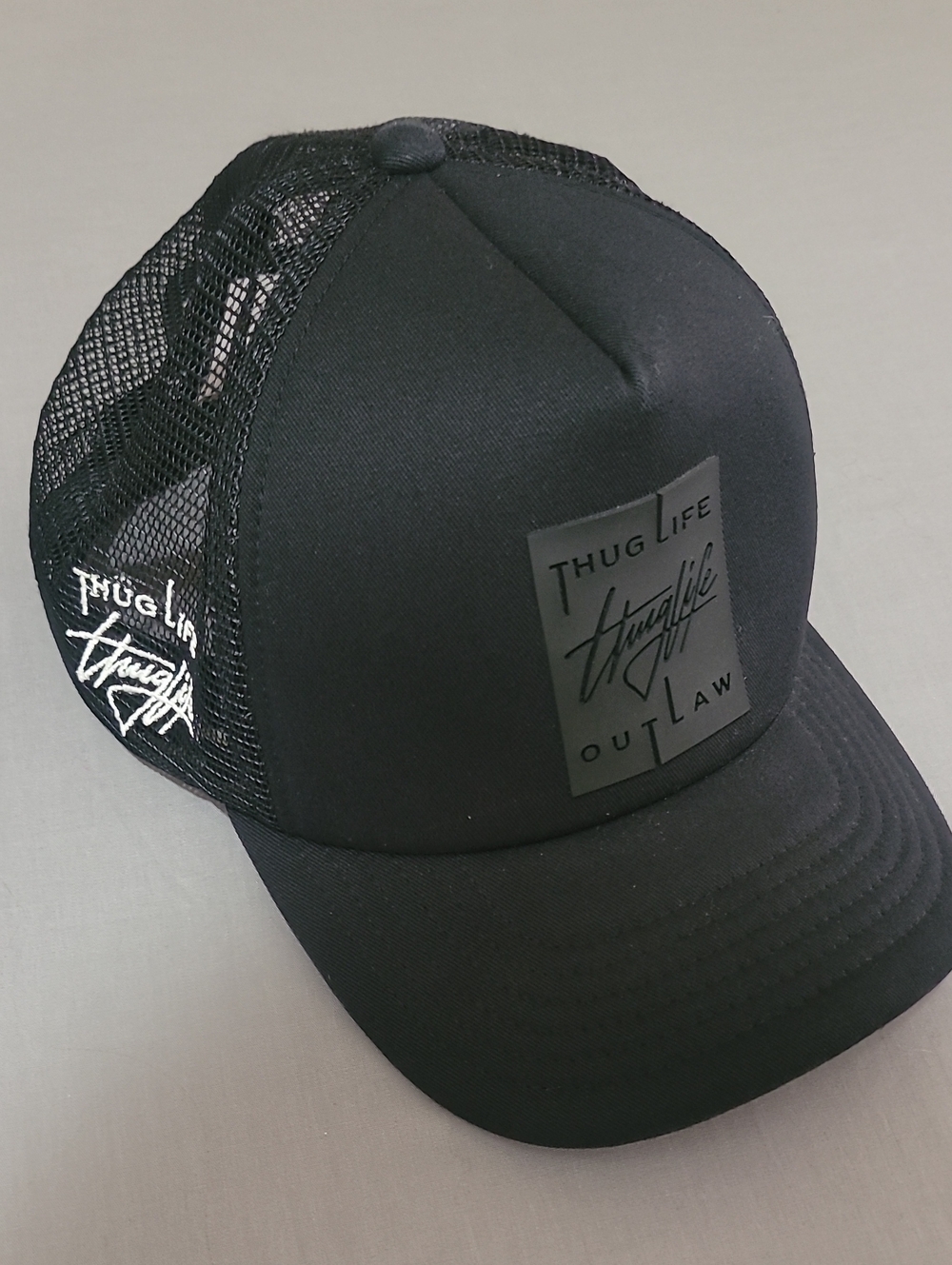 Outlaw Black Mesh Trucker Cap